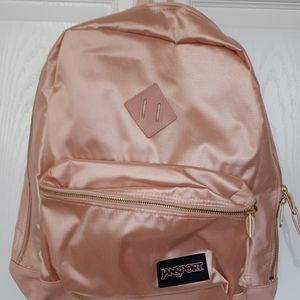 Rose gold Jansport backpack